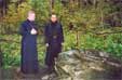 с игуменом монастыря преп. Павла Обнорского у камня, на котором молился святой основатель обители